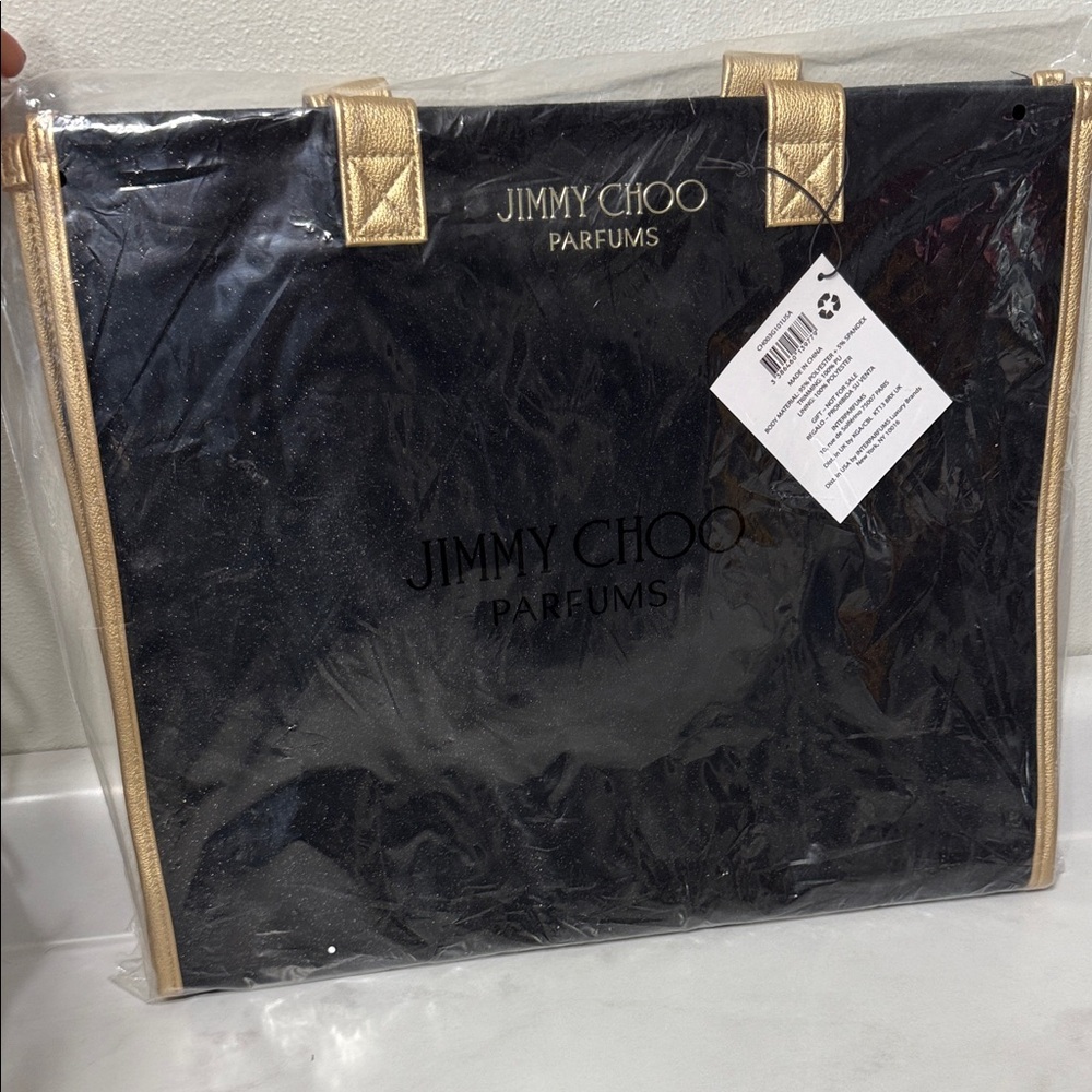 Jimmy Choo Black and Gold Travel Bag